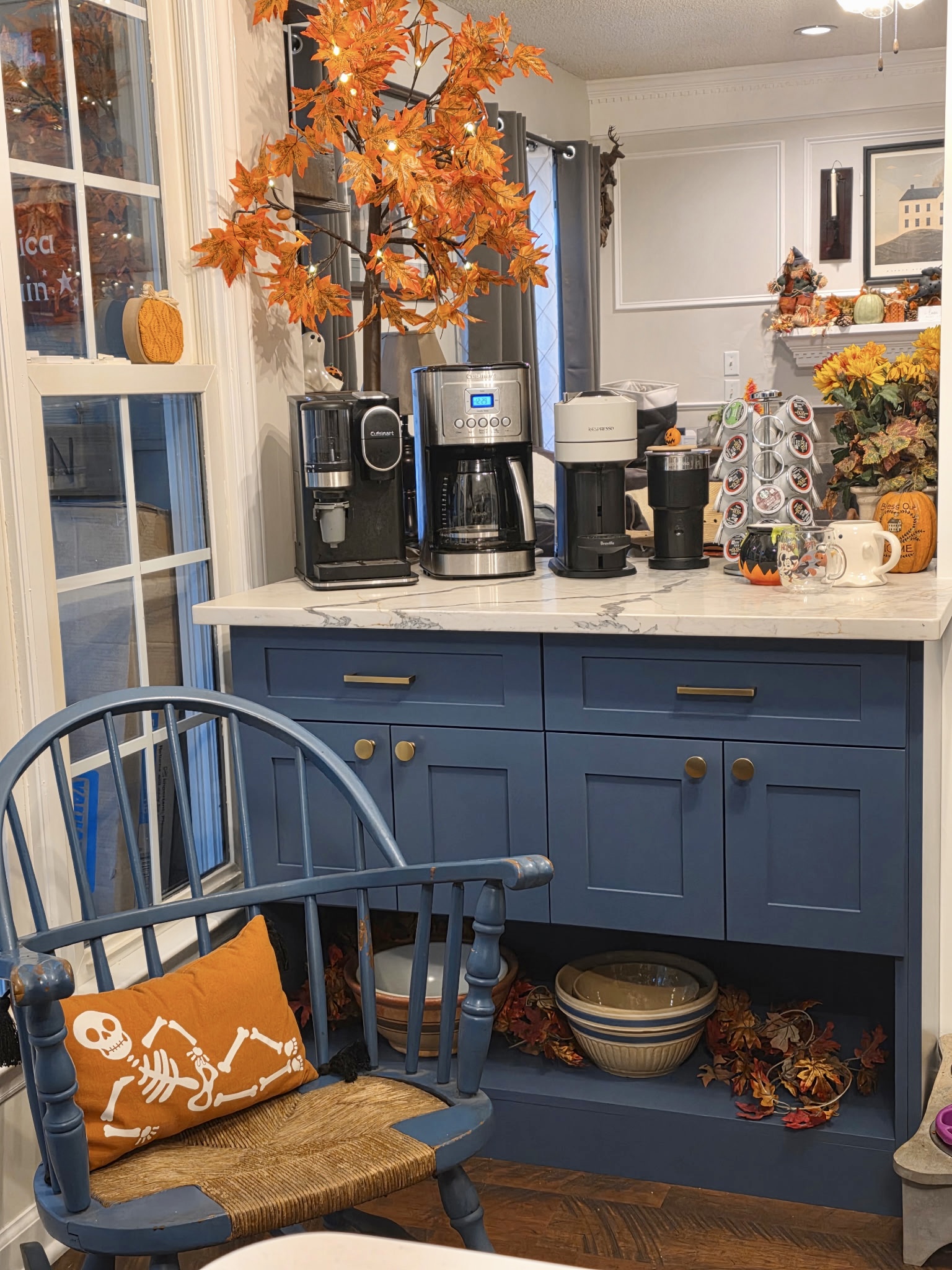 Custom navy coffee bar cabinet with brass hardware