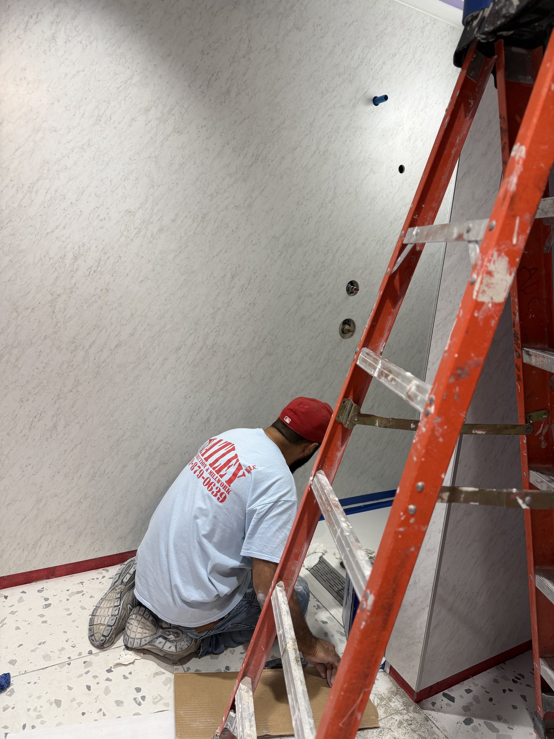 Hatley crew installing wall panels on commercial project